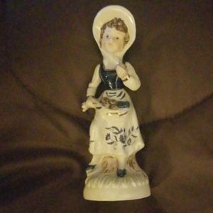 Vintage blue and white porcelain figurine